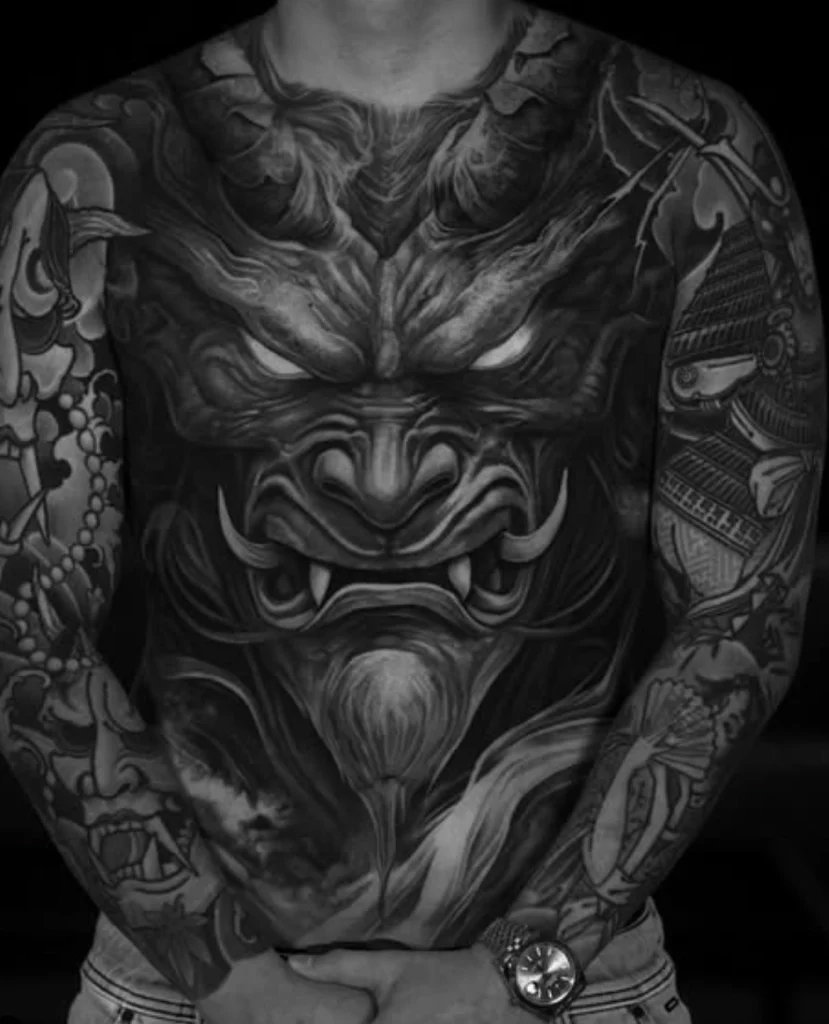 Large-scale first tattoo featuring traditional Japanese hannya mask design, created by Melbourne tattoo artists